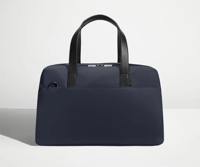 away-the-overnight-bag-in-navy-blue-medium-duffle-with-padded-laptop-sleeve image 1