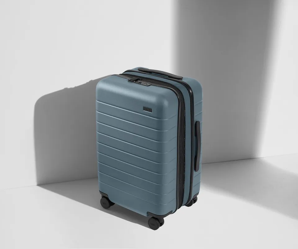 away-the-carry-on-flex-in-coast-blue-expandable-carry-on-luggage image 1
