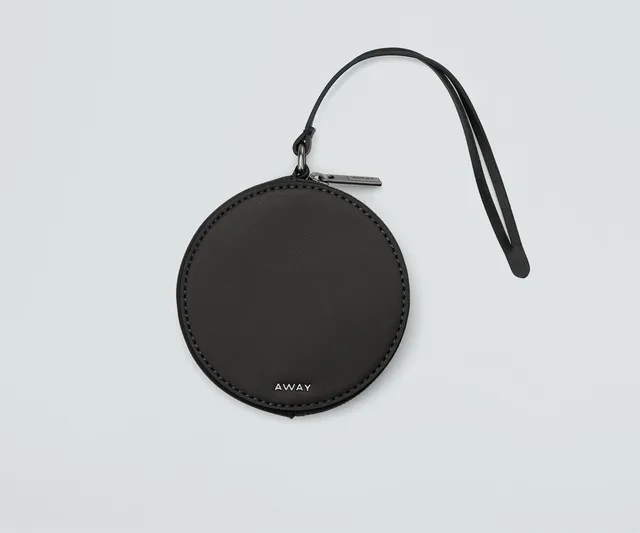 away-the-circle-zip-pouch-in-jet-black-compact-round-pouch-for-essentials image 1