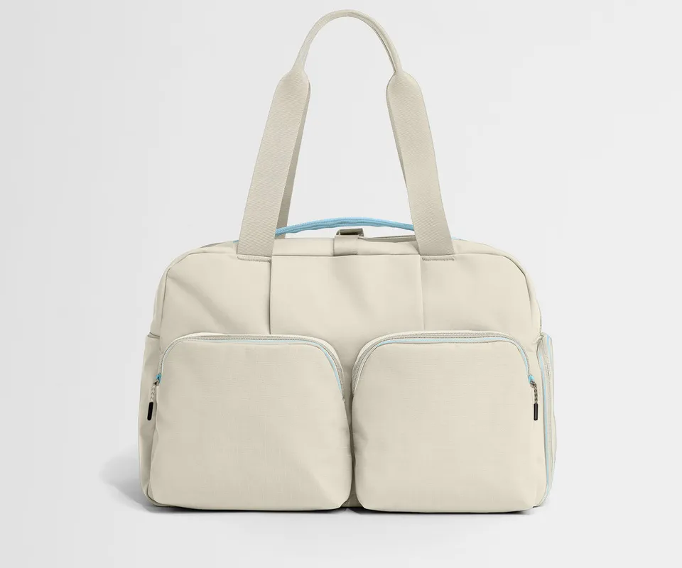 away-gym-bag-in-salt-white-performance-workout-duffle-with-shoe-garage image 1