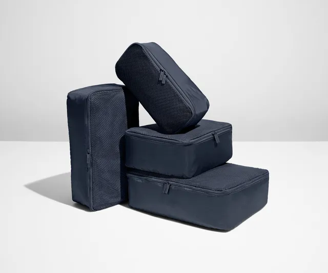 away-insider-packing-cubes-set-of-4-in-navy-blue image 1