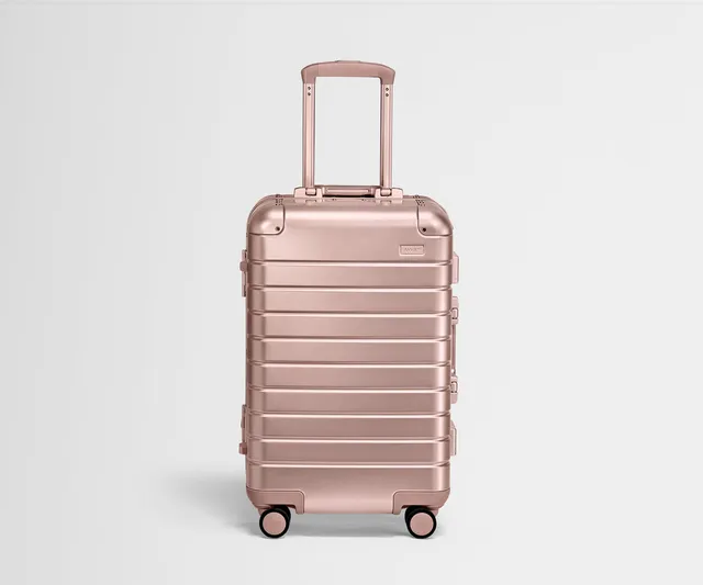 away-the-bigger-carry-on-aluminum-edition-rose-gold-360-spinner-suitcase image 1