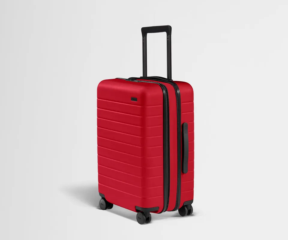 away-the-bigger-carry-on-flex-in-cherry-red-expandable-carry-on-luggage image 1