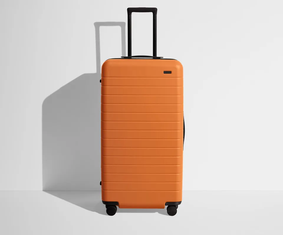away-the-trunk-in-sorbet-orange-large-checked-suitcase image 1