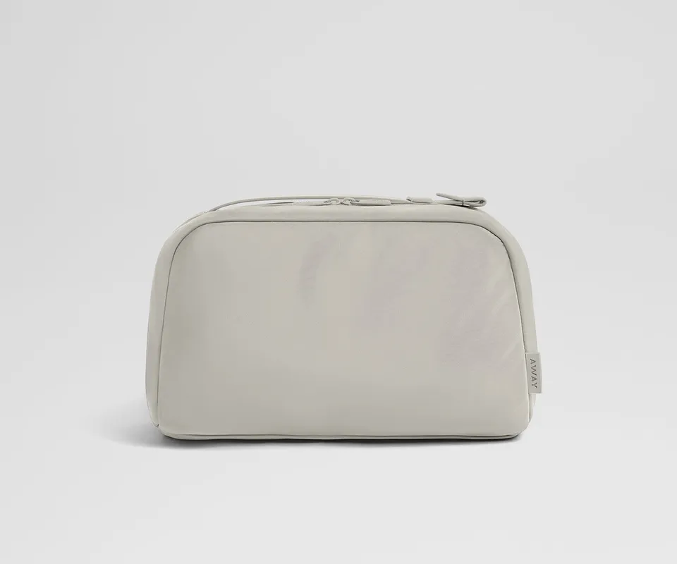 away-large-toiletry-bag-in-cloud-gray-premium-travel-organizer-with-multi-compar image 1