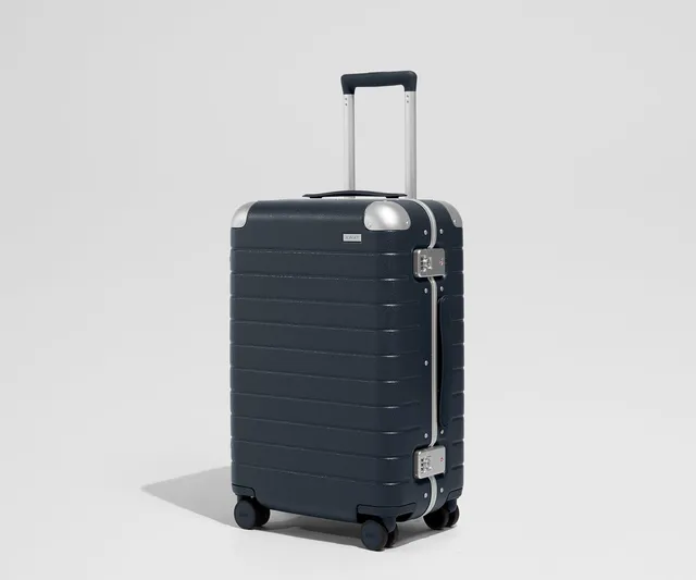 away-the-aluminum-edge-bigger-carry-on-in-navy-blue image 1