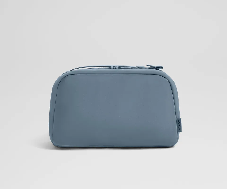 away-large-toiletry-bag-in-coast-blue-travel-ready-organizer-with-exterior-zip-p image 1