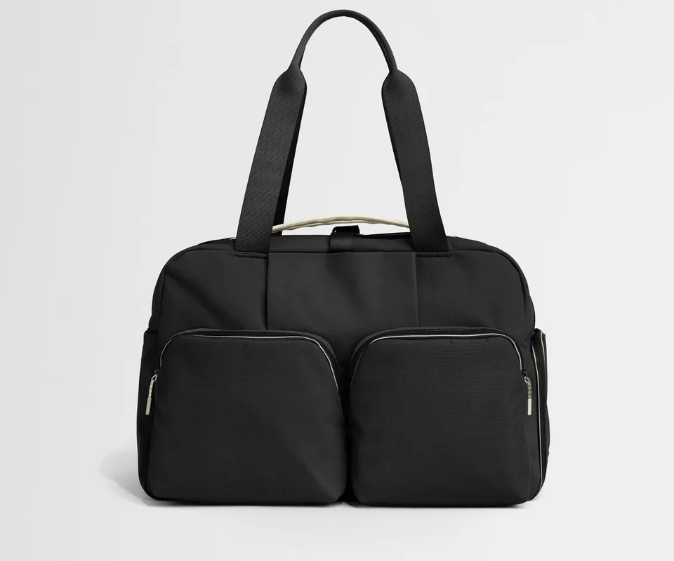 away-gym-bag-in-jet-black-versatile-performance-duffle-with-shoe-garage image 1