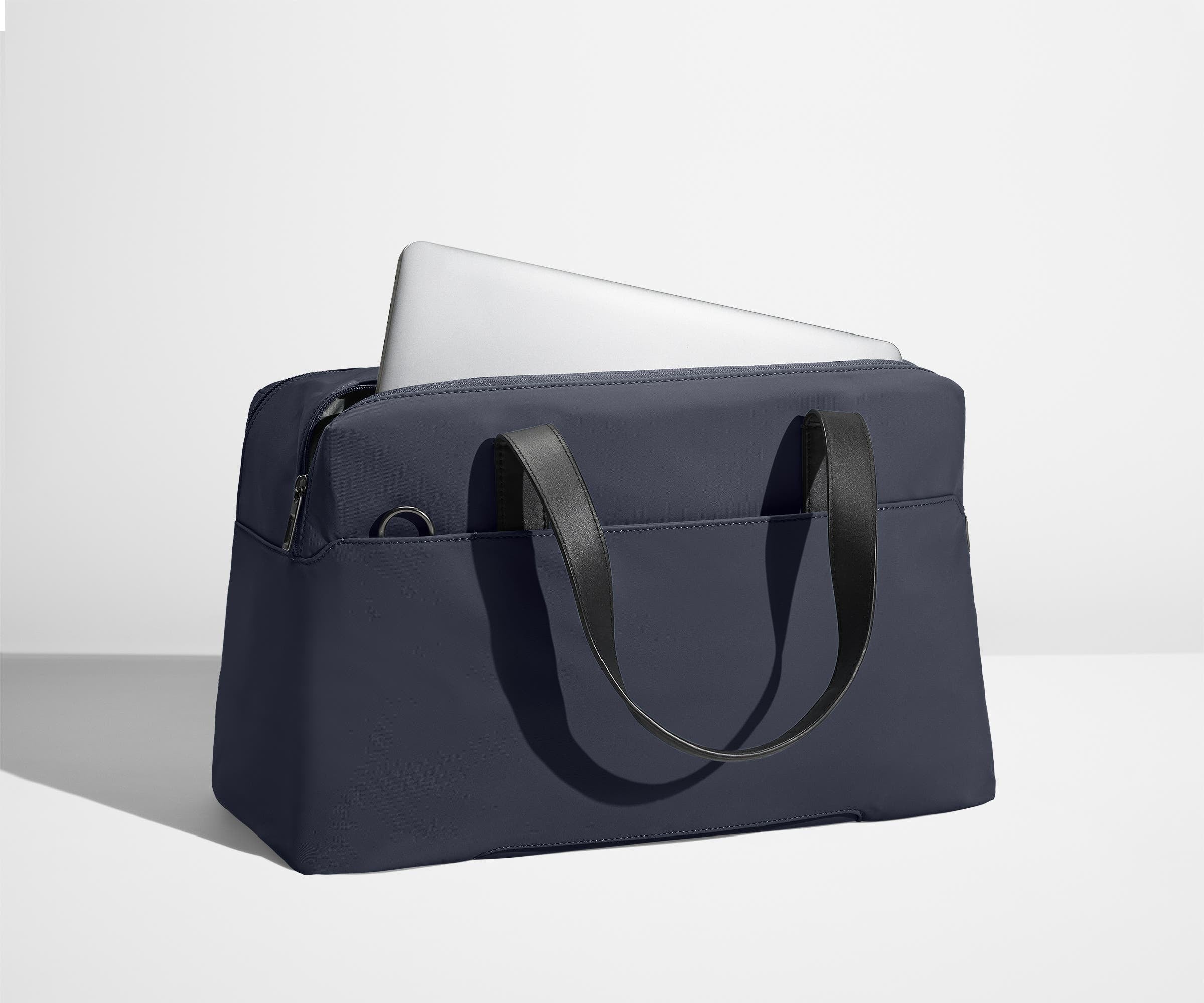 away-the-overnight-bag-in-navy-blue-medium-duffle-with-padded-laptop-sleeve image 5