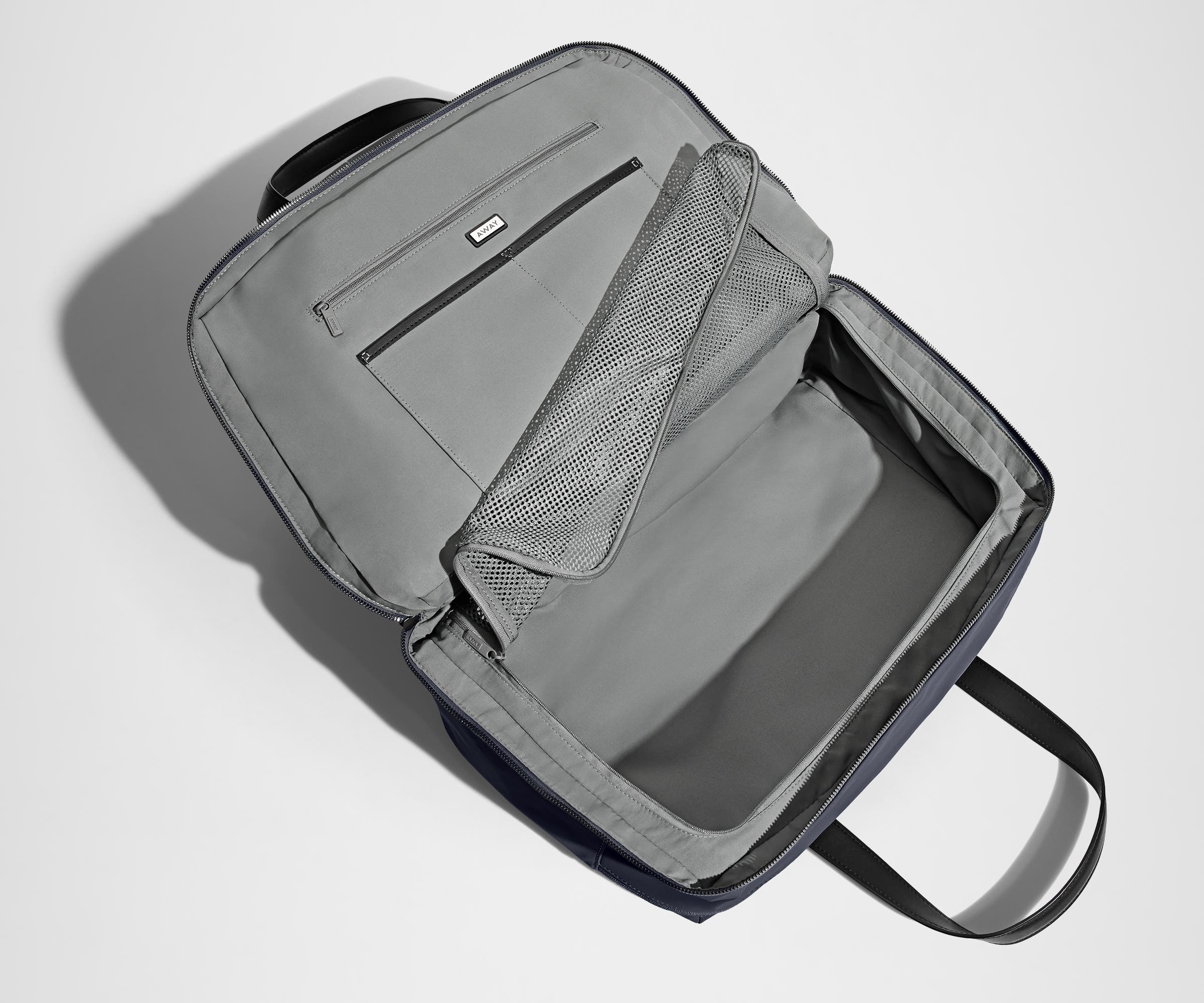 away-the-overnight-bag-in-navy-blue-medium-duffle-with-padded-laptop-sleeve image 6