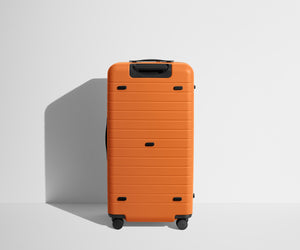 away-the-trunk-in-sorbet-orange-large-checked-suitcase image 6