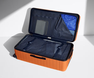 away-the-trunk-in-sorbet-orange-large-checked-suitcase image 4
