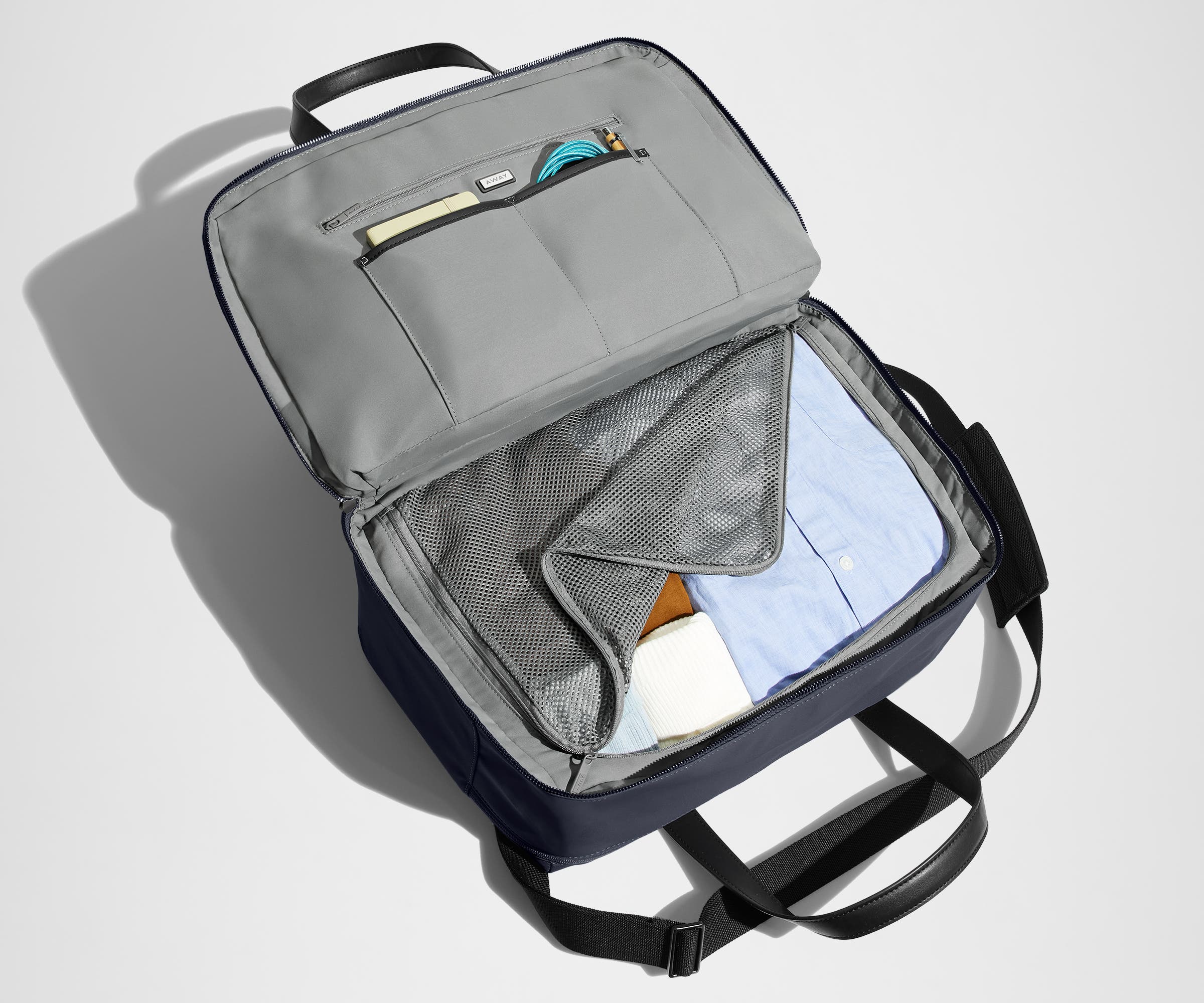 away-the-overnight-bag-in-navy-blue-medium-duffle-with-padded-laptop-sleeve image 4
