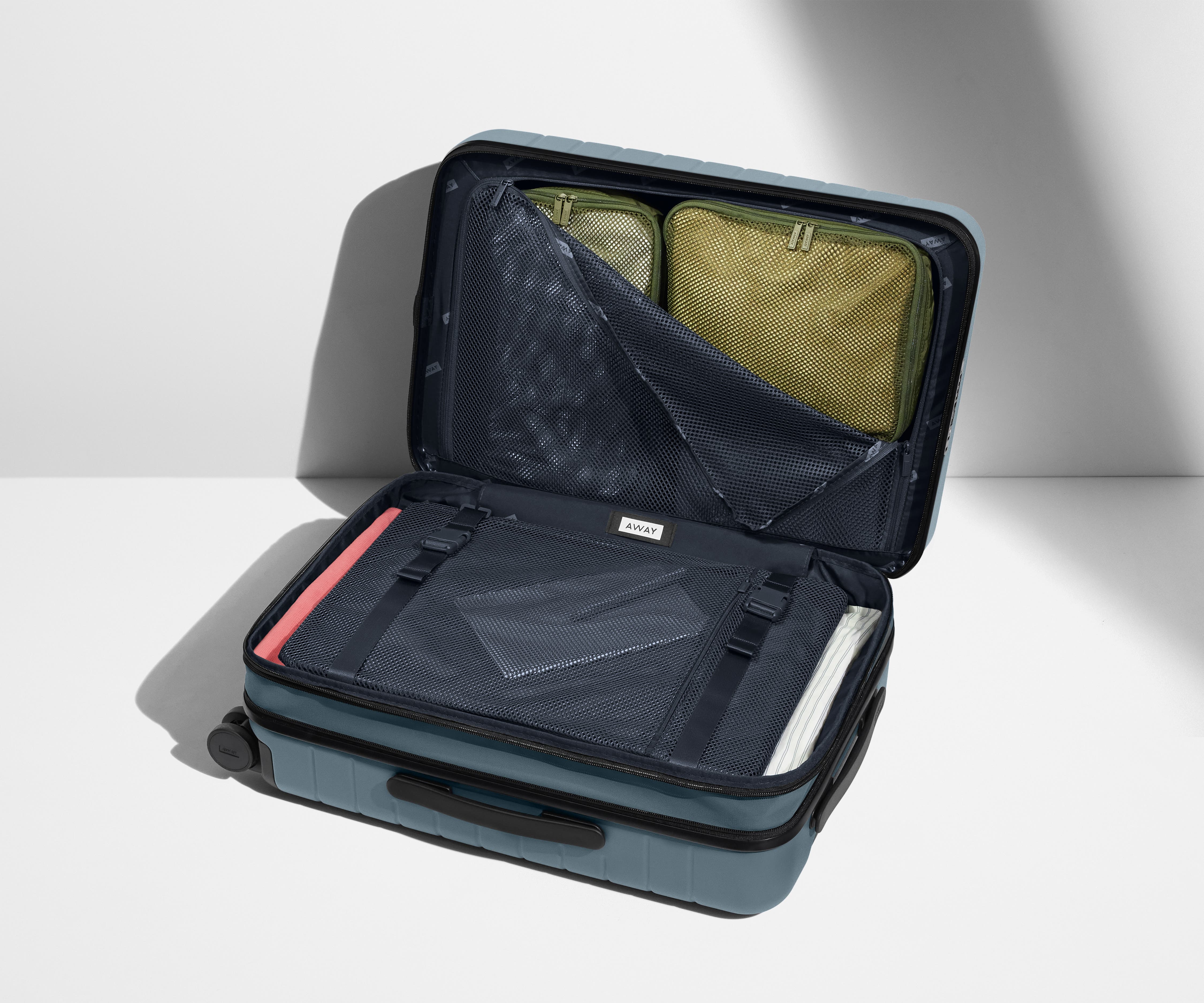 away-the-carry-on-flex-in-coast-blue-expandable-carry-on-luggage image 7