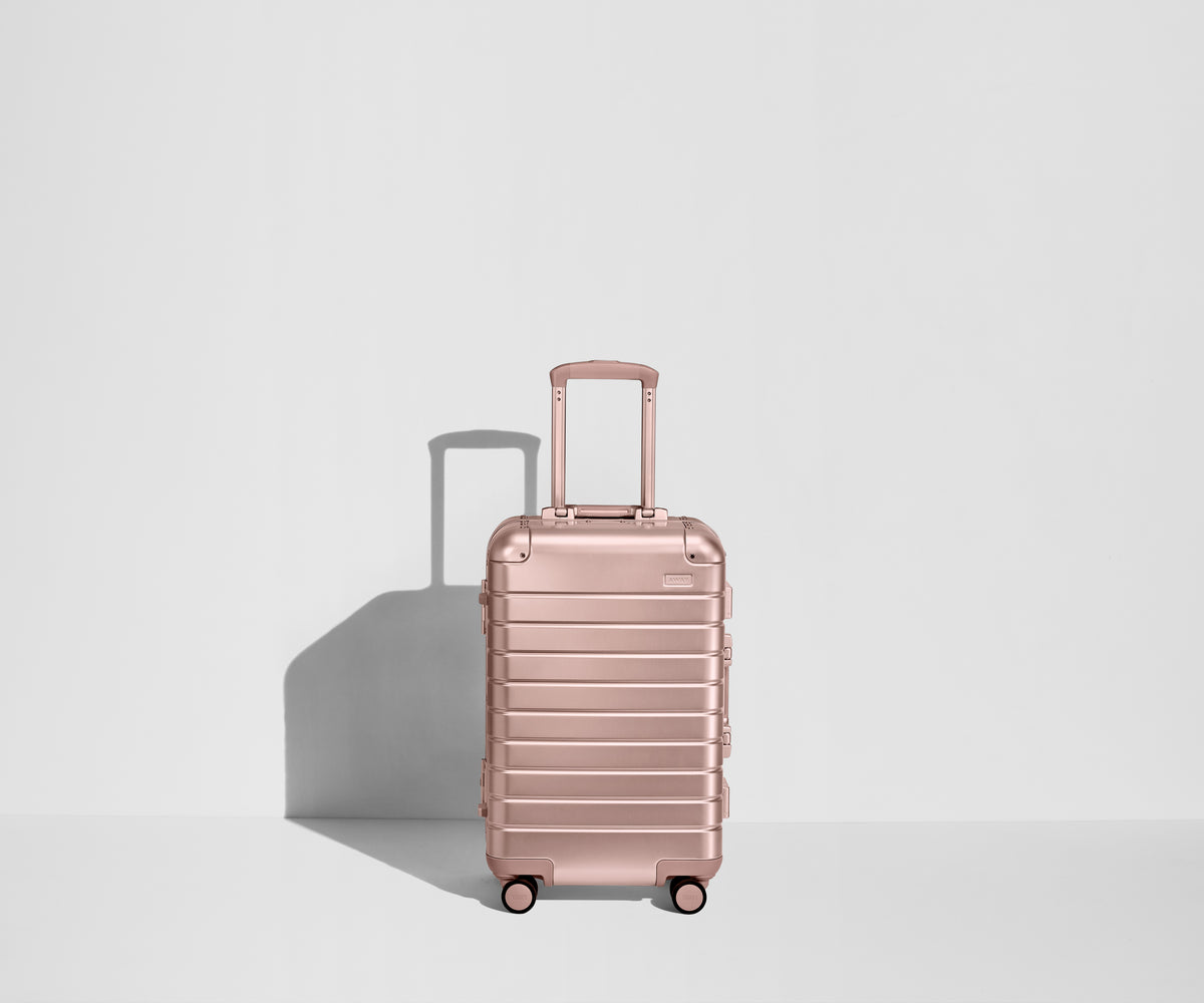 away-the-bigger-carry-on-aluminum-edition-rose-gold-with-usb-charger image 1