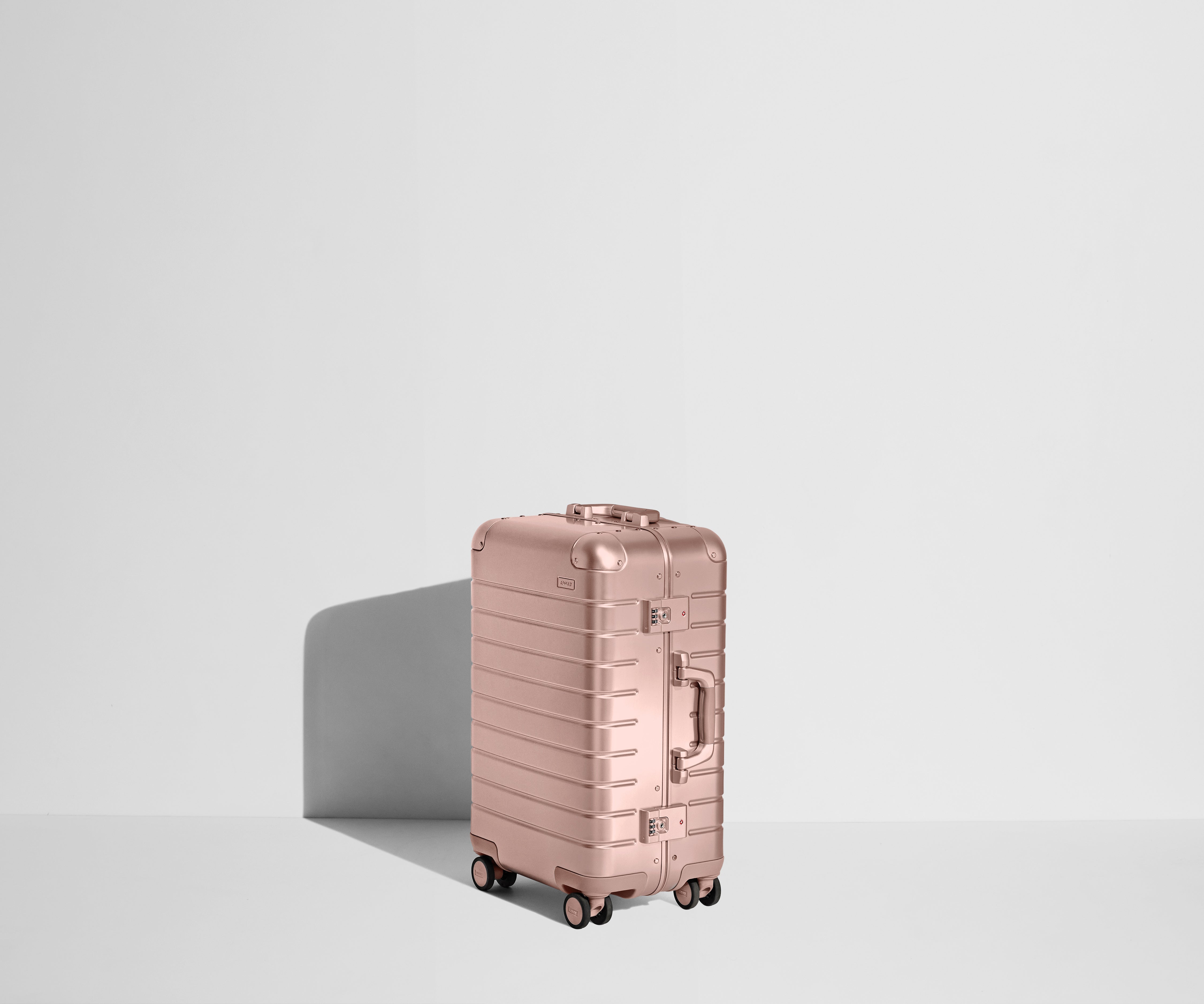 away-the-bigger-carry-on-aluminum-edition-rose-gold-with-usb-charger image 3