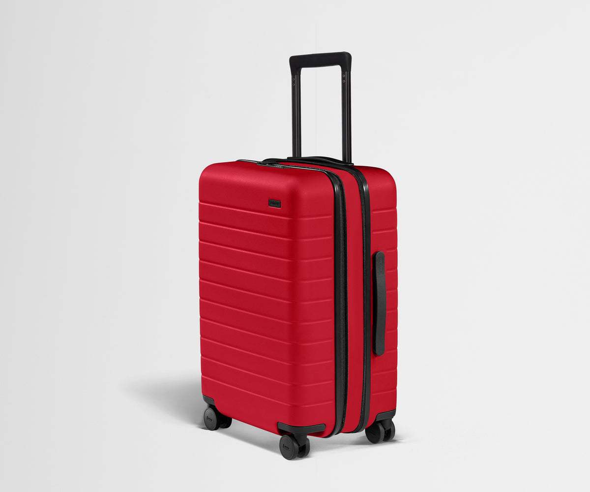 away-the-bigger-carry-on-flex-in-cherry-red-expandable-carry-on-luggage image 1