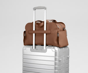 away-leather-duffle-in-saddle-brown-genuine-pebbled-leather-carry-on-compatible image 6
