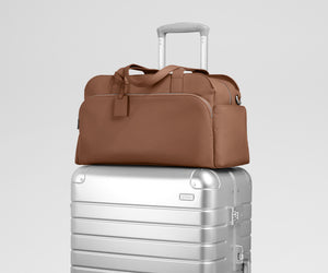 away-leather-duffle-in-saddle-brown-genuine-pebbled-leather-carry-on-compatible image 7
