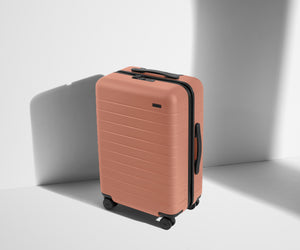 away-the-bigger-carry-on-in-clay-pink-hard-shell-carry-on-luggage image 3