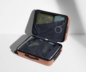 away-the-bigger-carry-on-in-clay-pink-hard-shell-carry-on-luggage image 5