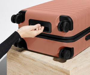 away-the-bigger-carry-on-in-clay-pink-hard-shell-carry-on-luggage image 6
