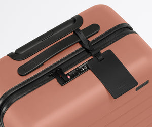 away-the-bigger-carry-on-in-clay-pink-hard-shell-carry-on-luggage image 8