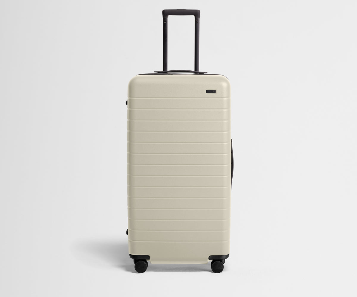 away-the-trunk-in-salt-white-spacious-checked-luggage image 1
