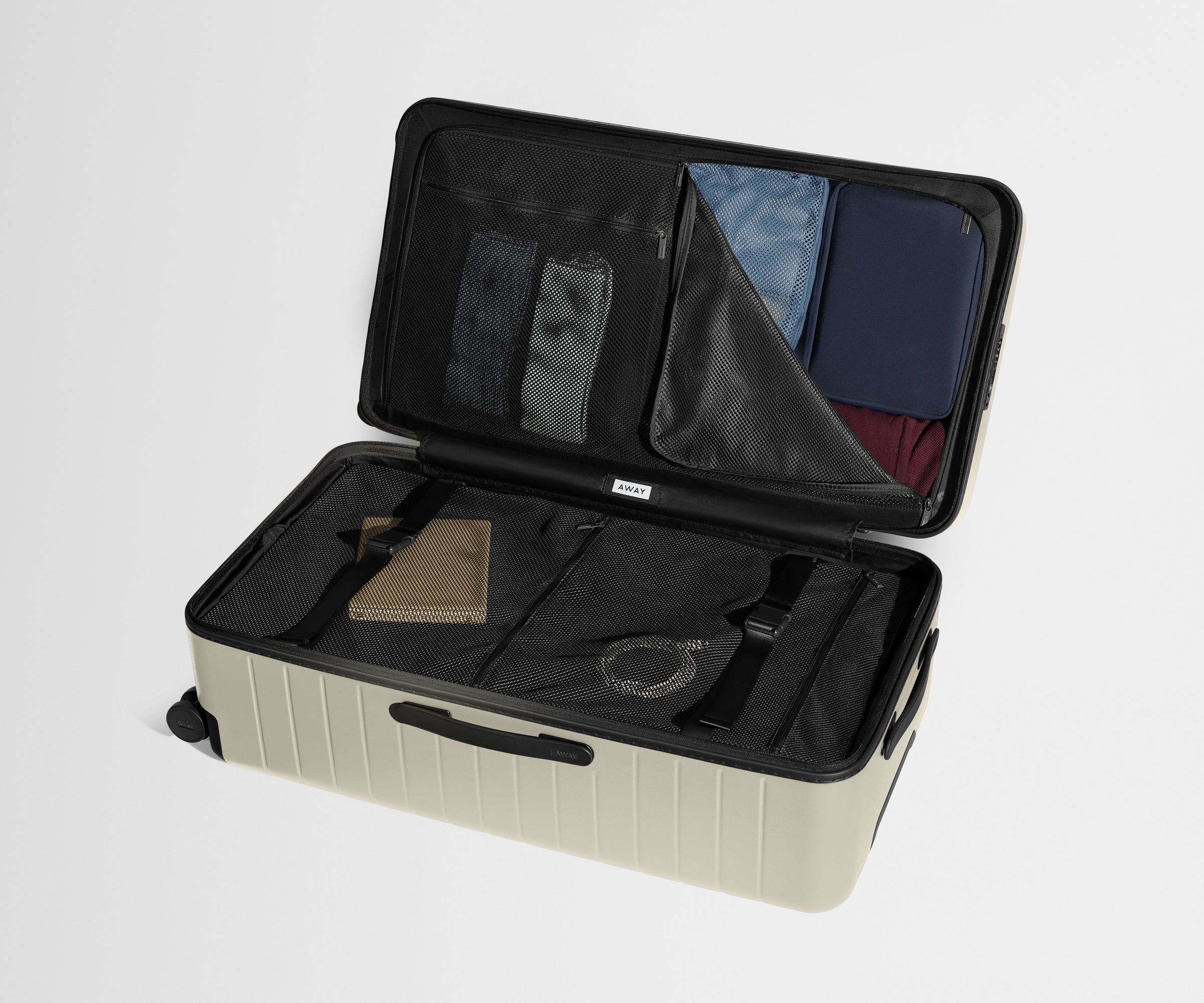 away-the-trunk-in-salt-white-spacious-checked-luggage image 6