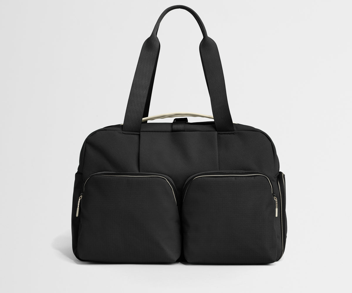 away-gym-bag-in-jet-black-versatile-performance-duffle-with-shoe-garage image 1