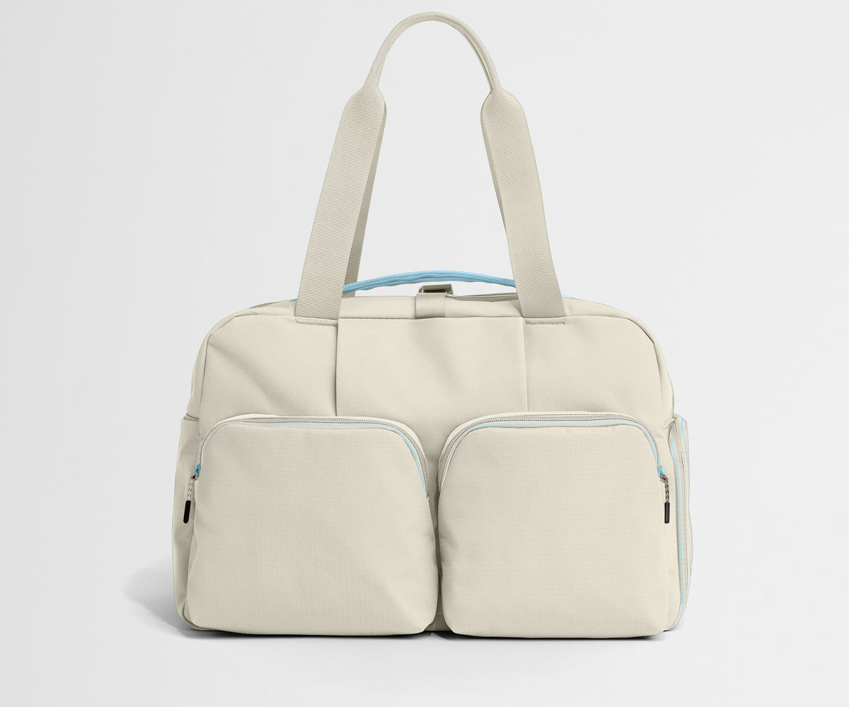 away-gym-bag-in-salt-white-performance-workout-duffle-with-shoe-garage image 1