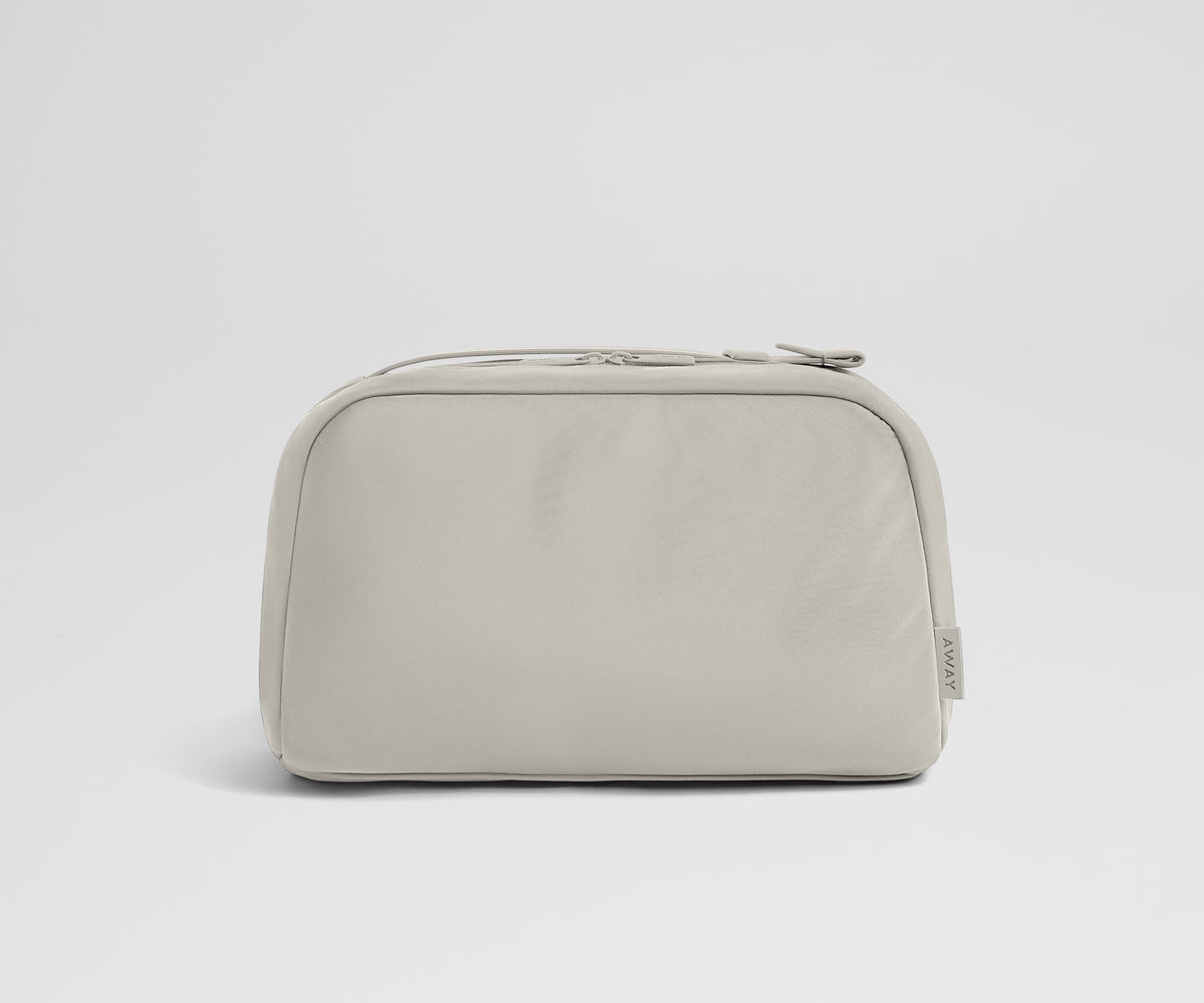 away-large-toiletry-bag-in-cloud-gray-premium-travel-organizer-with-multi-compar image 1